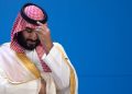 30 November 2018, Argentina, Buenos Aires: Mohammed bin Salman, Saudi Crown Prince, is waiting for the family photo of all participants at the G20 Summit Conference Centre in Buenos Aires. From 30.11.-1.12.2018 the G20 summit will take place in Buenos Aires. The "Group of 20" unites the strongest industrial nations and emerging economies. Photo: Ralf Hirschberger/dpa (Photo by Ralf Hirschberger/picture alliance via Getty Images)