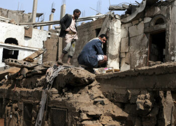SANA’A, YEMEN – JUNE 25: People search for survivors under rubble of a house after it was destroyed by an airstrike of the Saudi-led coalition, that killed eight members of one family, and injured 15 others on June 25, 2018 in Amran province north Sana’a, Yemen. (Photo by Mohammed Hamoud/Getty Images)