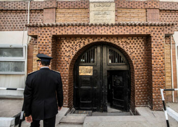 An Egyptian police officer entering Tora Prison on the southern outskirts of Cairo, during a guided tour organized by Egypt's State Information Service, Feb. 11, 2020. (Photo by Khaled Desouki/AFP via Getty Images)