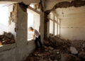A Yemeni student is seen at the destroyed Shuhada-Alwahdah school in Al-Radhmah district, Ibb province, western Yemen, on April 12, 2022. Thousands of schools have been destroyed and abandoned in Yemen as a result of the civil war, according to teacher's unions, which warn that illiteracy among the younger generation is on the rise and the country's future is being gradually destroyed. (Photo by Mohammed Mohammed/Xinhua via Getty Images) TO GO WITH Feature: Students at Yemen's "rubble school" struggle to keep learning
