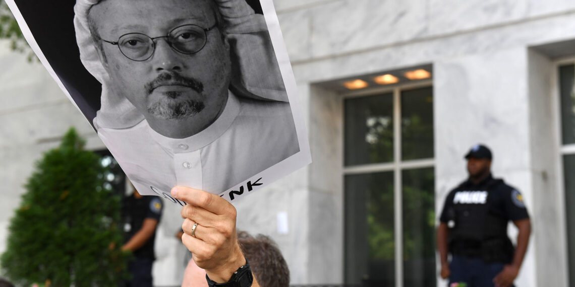 WASHINGTON, DC - OCTOBER 10: Michael Beer holds a poster during a rally about the disappearance of Washington Post journalist, Jamal Khashoggi outside the Embassy of Saudi Arabia on Wednesday October 10, 2018 in Washington, DC. Khashoggi disappeared after entering the Saudi Consulate in Instanbul. (Photo by Matt McClain/The Washington Post via Getty Images)
