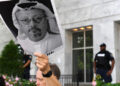 WASHINGTON, DC - OCTOBER 10: Michael Beer holds a poster during a rally about the disappearance of Washington Post journalist, Jamal Khashoggi outside the Embassy of Saudi Arabia on Wednesday October 10, 2018 in Washington, DC. Khashoggi disappeared after entering the Saudi Consulate in Instanbul. (Photo by Matt McClain/The Washington Post via Getty Images)