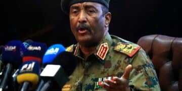 Sudan's top army general Abdel Fattah al-Burhan speaks during a press conference at the General Command of the Armed Forces in Khartoum on October 26, 2021. - Angry Sudanese stood their ground in street protests against a coup, as international condemnation of the military's takeover poured in ahead of a UN Security Council meeting. (Photo by ASHRAF SHAZLY / AFP) (Photo by ASHRAF SHAZLY/AFP via Getty Images)