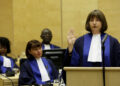 Silvia Fernandez De Gurmendi (R) of Argentina takes the oath during a swearing-in ceremony as a new judge of the International Criminal Court (ICC), in The Hague,  on January 20, 2010.  Kuniko Ozaki of Japan and Silvia Fernandez de Gurmendi of Argentina are officially sworn in as ICC Judges after they were elected on  November 18, 2009 by the Assembly of States Parties for nine-year terms. ANP AFP PHOTO BAS CZERWINSKI netherlands out - belgium out (Photo credit should read BAS CZERWINSKI/AFP via Getty Images)
