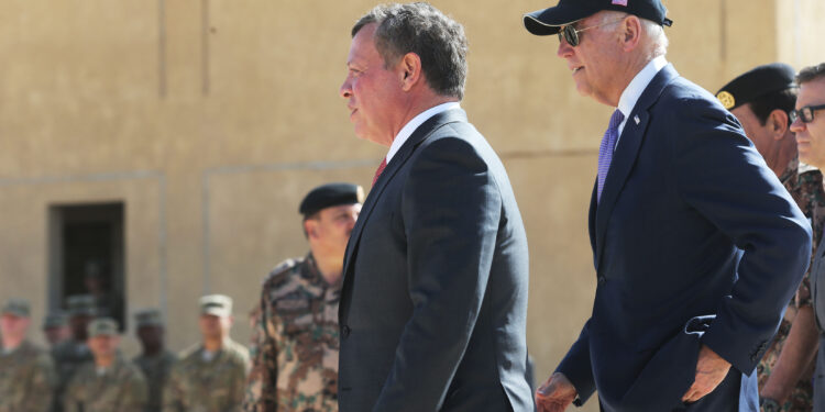 ZARQA, JORDAN - MARCH 10: U.S Vice President Joe Biden (R) visits with Jordan's King Abdullah (L) at a joint Jordanian-American training center on March 10, 2016 in Zarqa northeast of Amman, Jordan. This is the final stop on Biden's Middle East tour that also took in Israel and the Palestinian territories. (Photo by Jordan Pix/Getty Images)