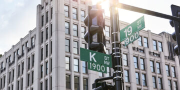 Streetsign for K Street, the Wall Street of political influence in the US capital. Sunrise in the district of the political lobbyist.
