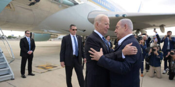 TEL AVIV, ISRAEL - OCTOBER 18: (----EDITORIAL USE ONLY - MANDATORY CREDIT - 'ISRAELI GOVERNMENT PRESS OFFICE (GPO) / HANDOUT' - NO MARKETING NO ADVERTISING CAMPAIGNS - DISTRIBUTED AS A SERVICE TO CLIENTS----) US President Joe Biden is welcomed by Prime Minister Benjamin Netanyahu (R) at the Ben Gurion Airport in Tel Aviv, Israel on October 18, 2023. (Photo by GPO/ Handout/Anadolu via Getty Images)