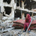 A Palestinian woman reacts as she sits amidst the rubble of Gaza's Al-Shifa hospital after the Israeli military withdrew from the complex housing the hospital on April 1, 2024, amid the ongoing battles Israel and the Hamas militant group. (Photo by AFP)