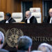 Judge and President of the International Court of Justice (ICJ), Nawaf Salam (2nd R) delivers a non-binding ruling on the legal consequences of the Israeli occupation of the West Bank and East Jerusalem at the International Court of Justice (ICJ) in The Hague on July 19, 2024. The UN's top court handed down its view, on July 19, 2024, declaring "illegal" Israel's occupation of Palestinian territories since 1967, amid growing international pressure over the war in Gaza. (Photo by Nick Gammon / AFP)