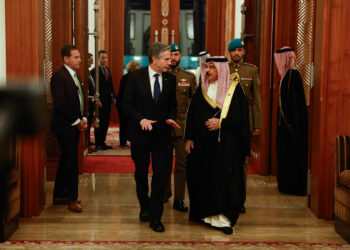 US Secretary of State Antony Blinken (L) walks with Bahrain's King Hamad bin Isa bin Salman al-Khalifa at the start of their meeting in Manama, on the latest leg of his week-long trip across the Middle East on January 10, 2024. Blinken arrived in the Gulf state of Bahrain, home base of the US Fifth Fleet, for talks with King Hamad on preventing a regional escalation of the war between Israel and Hamas militants in Gaza, the State Department said. (Photo by EVELYN HOCKSTEIN / POOL / AFP)