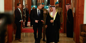 US Secretary of State Antony Blinken (L) walks with Bahrain's King Hamad bin Isa bin Salman al-Khalifa at the start of their meeting in Manama, on the latest leg of his week-long trip across the Middle East on January 10, 2024. Blinken arrived in the Gulf state of Bahrain, home base of the US Fifth Fleet, for talks with King Hamad on preventing a regional escalation of the war between Israel and Hamas militants in Gaza, the State Department said. (Photo by EVELYN HOCKSTEIN / POOL / AFP)