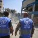 GAZA CITY, GAZA - JULY 15: UNRWA employees and Palestinians inspect a damaged school after Israeli fighter jets hit United Nations Relief and Works Agency for Palestine Refugees in the Near East (UNRWA) school, killing and injuring many in Nuseirat Refugee Camp of Deir al-Balah, Gaza on July 15, 2024. (Photo by Ashraf Amra/Anadolu via Getty Images)