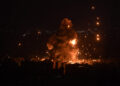 BEIRUT, LEBANON - OCTOBER 6: Smoke and flames rise among the residential buildings following an Israeli attack on Dahieh region in Beirut, Lebanon on October 6, 2024. (Photo by Houssam Shbaro/Anadolu via Getty Images)