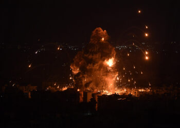 BEIRUT, LEBANON - OCTOBER 6: Smoke and flames rise among the residential buildings following an Israeli attack on Dahieh region in Beirut, Lebanon on October 6, 2024. (Photo by Houssam Shbaro/Anadolu via Getty Images)