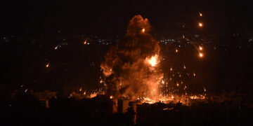 BEIRUT, LEBANON - OCTOBER 6: Smoke and flames rise among the residential buildings following an Israeli attack on Dahieh region in Beirut, Lebanon on October 6, 2024. (Photo by Houssam Shbaro/Anadolu via Getty Images)