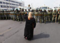 Chinese policemen guard at streets on July 7, 2009 in the capital of Xinjiang Uygur autonomous region of China.