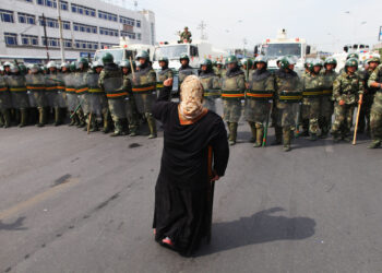 Chinese policemen guard at streets on July 7, 2009 in the capital of Xinjiang Uygur autonomous region of China.