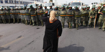 Chinese policemen guard at streets on July 7, 2009 in the capital of Xinjiang Uygur autonomous region of China.