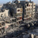 A general view shows destroyed building and the rubble of the al-Faruq mosque on February 22, 2024, following an overnight Israeli air strike in Rafah refugee camp in the southern Gaza Strip, amid continuing battles between Israel and the Palestinian militant group Hamas. (Photo by SAID KHATIB / AFP)