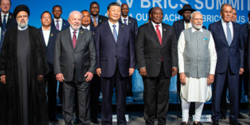 JOHANNESBURG, SOUTH AFRICA - AUGUST 24: South African President Cyril Ramaphosa with fellow Brics leaders pose for a family photo with new Bric members at the last day of the Brics summit fellow leaders president, Xi Jinping, China's president, Cyril Ramaphosa, South Africa's president, Narendra Modi, India's prime minister, and Sergei Lavrov, Russia's foreign minister, Iranian president is Ebrahim Raisi, on the closing day of the BRICS summit at the Sandton Convention Center in the Sandton district of Johannesburg on August 24, 2023, South Africa. The Brics summit, held in South Africa between 22-24 August 2023. Brics is made up of Brazil, Russia, India, China and South Africa. New Members are Argentina, Egypt, Ethiopia, Iran, the U.A.E. and Saudi Arabia. Some of the things are discussed during the summit is if to expand Brics and accept new members like Saudi Arabia and Iran, and a Brics currency. Vladimir Putin wanted to attend the meetings but South African president Cyril Ramaphosa managed to talk him out of it, as he risked being arrested while in in South Africa, as the ICC, International Criminal Court has issued a warrant of arrest for Mr. Putin's on suspicion of unlawful deportation of children and unlawful transfer of people from the territory of Ukraine to the Russian Federation  (Photo by Per-Anders Pettersson/Getty Images)