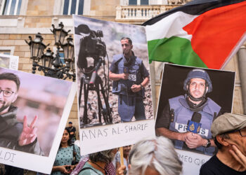 Journalists and media workers from Barcelona protest and express solidarity with the Al-Jazeera journalists and cameramen killed in Gaza while resting in their tent, in Barcelona, Spain, on August 13, 2025. Their names are Anas al Sharif, Mohammed Qreiqeh, Ibrahim Zaher, Moamen Aliva, and Mohammed Noufal. (Photo by Marc Asensio/NurPhoto via Getty Images)